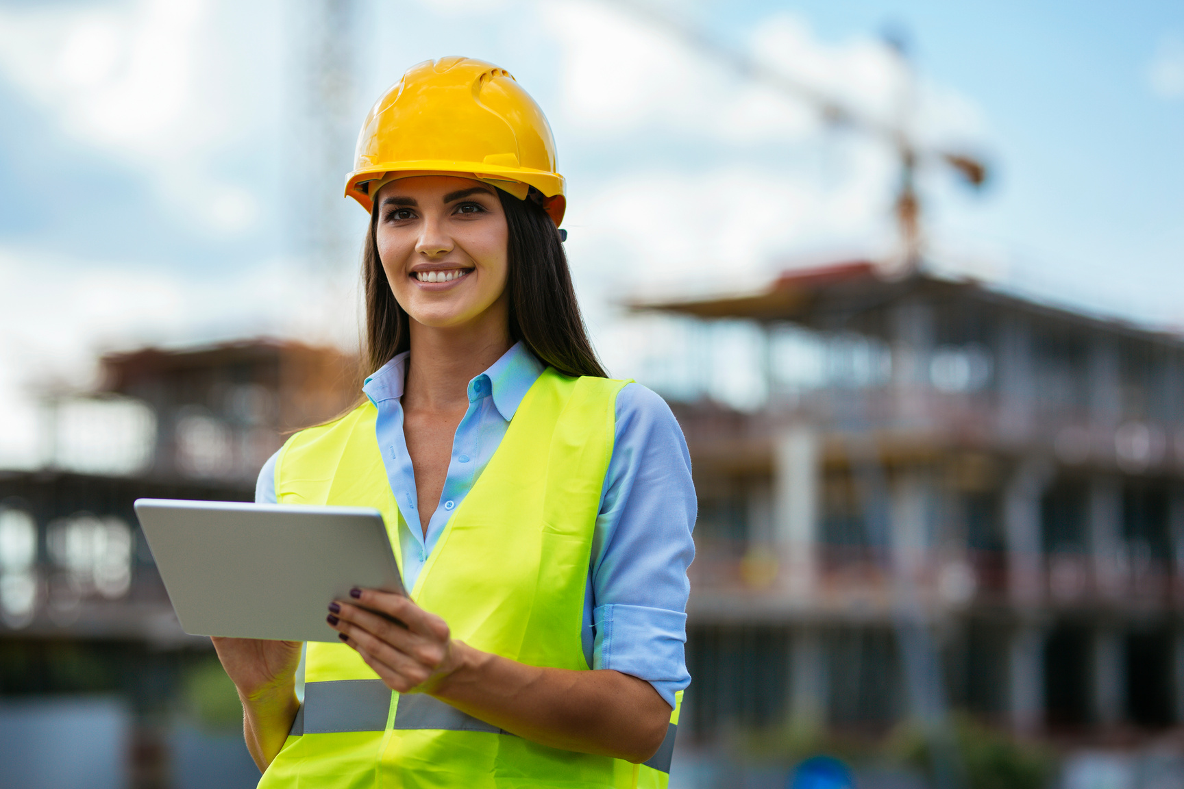 Young construction manager with digital tablet